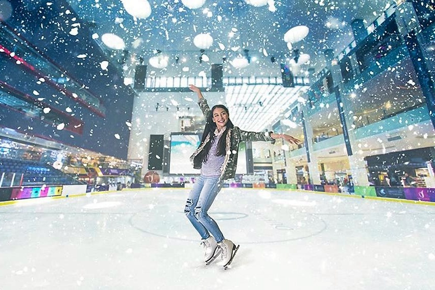 Dubai Ice Rink Snowfall and White Girl