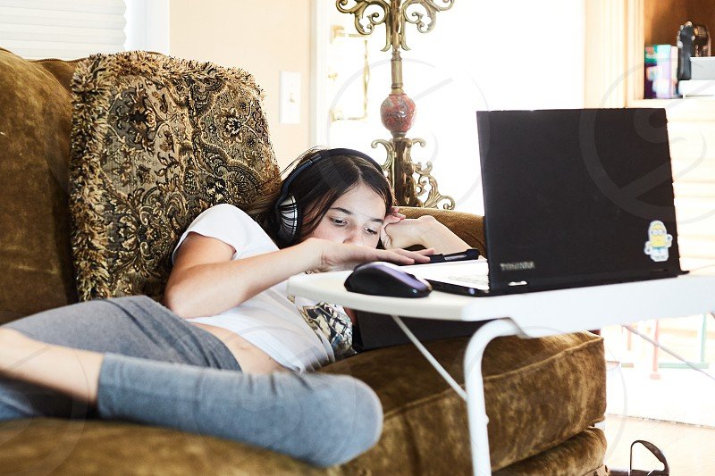 Female Relaxing With Computer